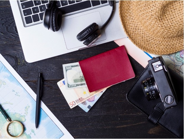 Which item is a benefit of using the travel card for ATM withdrawals?